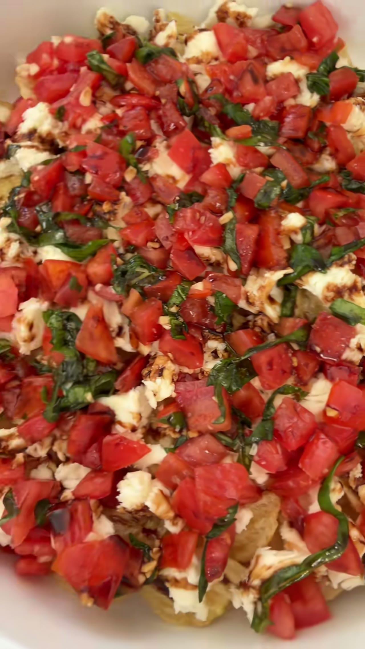 Bed of Potato Chips with Fresh Tomato Bruschetta